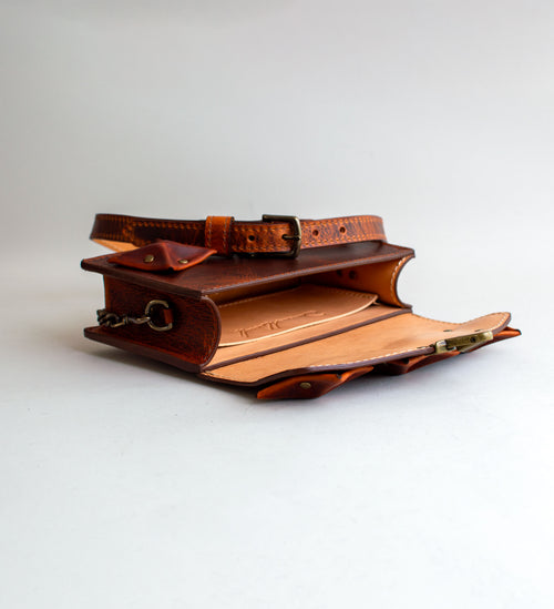 Interior-View-Of-Amber-Colored-luxury-leather-handbag-with-folded-origami-leather-embellishments-handmade-in-the-us-with-brass-hardware