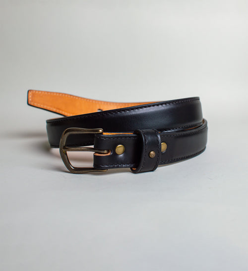 black belt with an antique brass buckle handmade in the us