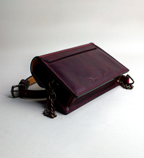 Rear-View-of-small-padded-handmade-luxury-purse-made-out-of-dark-red-italian-leather-by-duncan-maxwell