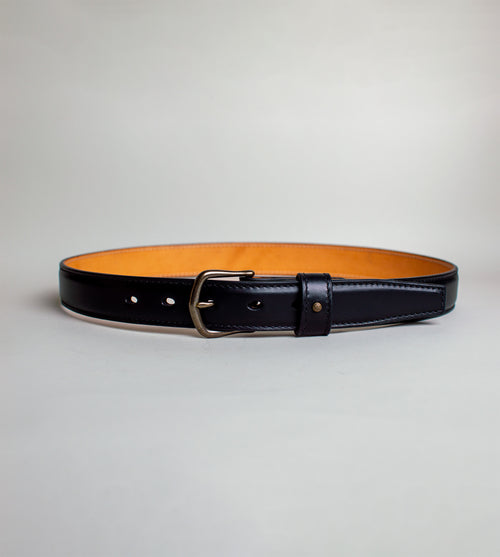 black belt with an antique brass buckle handmade in the us